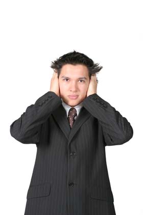 This business man with his hands over his ears personifies companies trying not to listen to their customers.